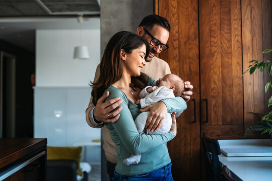 Father holding and bonding with baby